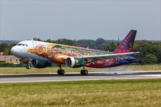 A Brussels Airlines Airbus A320 aircraft with the registration number OO-SNF and the Tomorrowland special livery at Brussels Airport