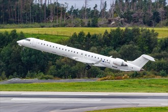 A Bombardier CRJ900 CityJet aircraft with the registration EI-FPB at Bergen Airport