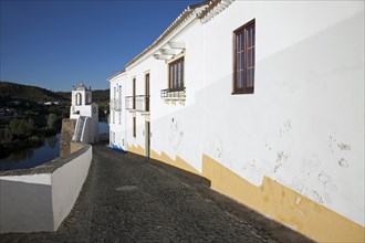 Alley along city wall in the town Mertola