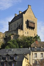 Ruins of the Larochette Castle towering above the town