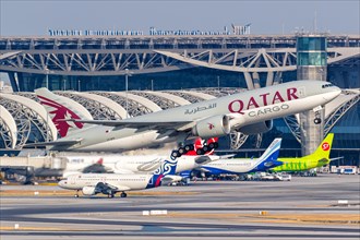 A Qatar Cargo Boeing 777-F aircraft with the registration number A7-BFK at Bangkok Suvarnabhumi Airport