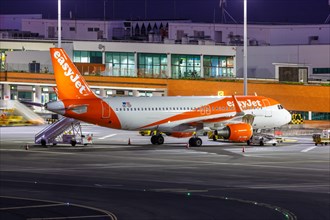 An EasyJet Europe Airbus A320 aircraft with the registration number OE-IZF at Funchal Airport