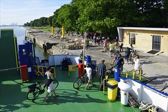 Cyclists leaving the ferry from Klaipeda to the Curonian Spit