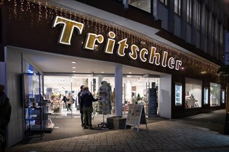 Night shot of traditional shop Tritschler