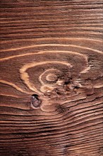 Vertical version close-up on old wooden board