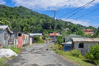 Streetscene in small rural village between Marigot Bay and Castries on the island of Saint Lucia in the Caribbean Sea
