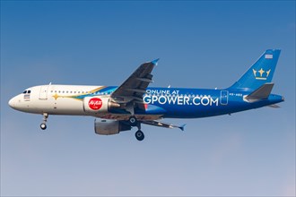 A Thai AirAsia Airbus A320 aircraft with the registration HS-ABX and the King Power special livery at Bangkok Don Mueang Airport