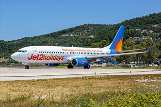 A Boeing 737-800 Jet2 aircraft with registration G-JZBP at Skiathos Airport