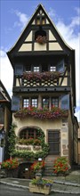 Colorful facade of timber framed house at Dambach-la-Ville