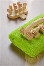 Wooden massagers and towel