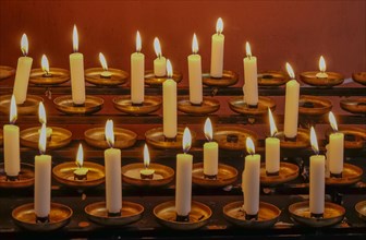 Sacrificial candles in a church