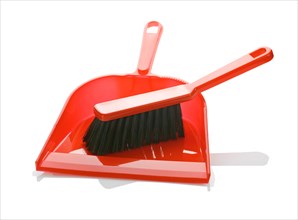 Red brush insulated on dustpan