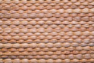 Natural raffia texture of the mat