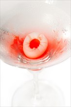 Lychee martini cocktail straight up isolated on white background