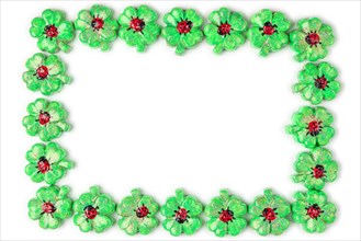 A frame of green shamrocks with ladybirds