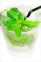 Mojito caipirina cocktail with fresh mint leaves