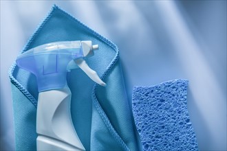 Blue washing rag sprayer sponge on white background