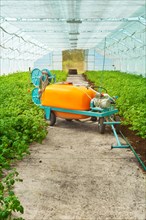 Large pesticide sprayer in the greenhouse