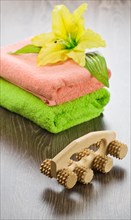 Flower on towels with massager