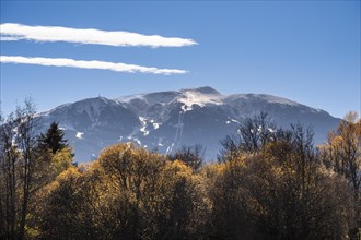 Autumn landscape in the Cerdanya area with snow-capped mountains in the background in the province of Gerona in Catalonia in Spain