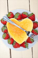 Heart shaped cheesecake with strawberryes ideal cake for valentine day