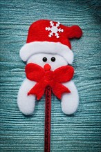 Father Christmas decoration on wooden board New Year concept