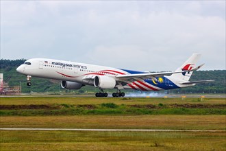 A Malaysia Airlines Airbus A350-900 aircraft with the registration 9M-MAC at Kuala Lumpur Airport