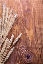 Copyspace background wheat on old wooden boards
