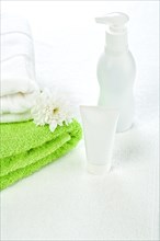 Bottle tube and cotton towels with flower