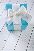 Blue gift box seen from above