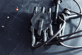 Engine ignition system distributor and high-voltage ignition cable wires connected