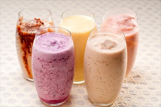 Selection of fresh fruits colorful long drink cocktails