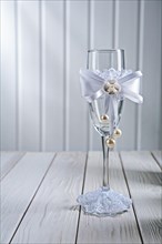 Single wine glasses wedding decorated