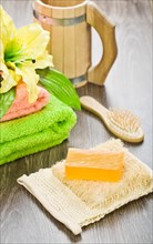 Accessories for bathing on a wooden surface