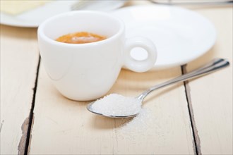 Italian espresso coffee over white wood table