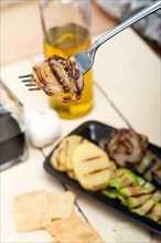 Grilled assorted vegetables dressed with extra virgin olive oil