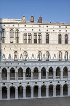 White decorated facade in the inner courtyard of the Doge's Palace