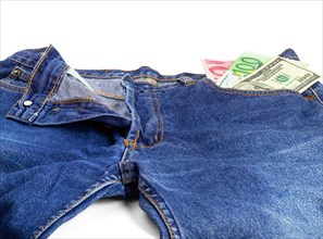 Money bills on pocket of a pair of blue jeans