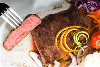 Fresh juicy beef ribeye steak sliced