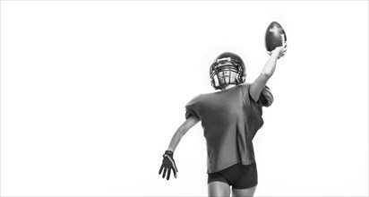 Black and white images of a sports girl in the uniform of an American football team player. Sports concept. White background.