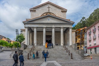 People entering the church of Our Lady of the Assumption in the coastal town of Mutriku