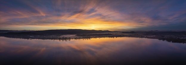 Aerial panorama of an atmospheric sunset over the Untersee