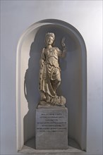 Statue from 1830 in the staircase of the Academy of Fine Arts and Museum