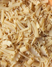 Mixed pasta of various shapes background