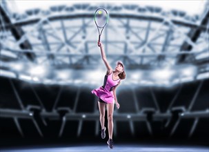Portrait of a tennis player in a pink dress against the background of a sports arena.