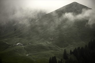 Alpine hut in a gloomy