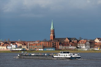 Barge on the Elbe with church in the background