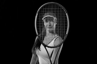 Image of a tennis player with a racket. Sports concept.
