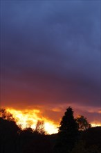 Sunset with dramitic dark clouds