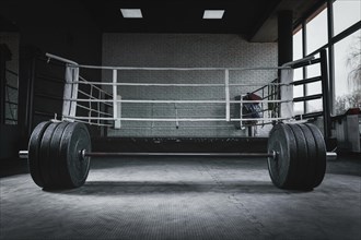 Image of barbell in the gym. The concept of sport and healthy lifestyle